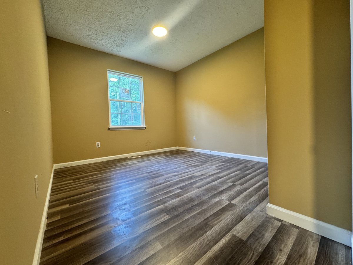 Finished bedroom with new flooring